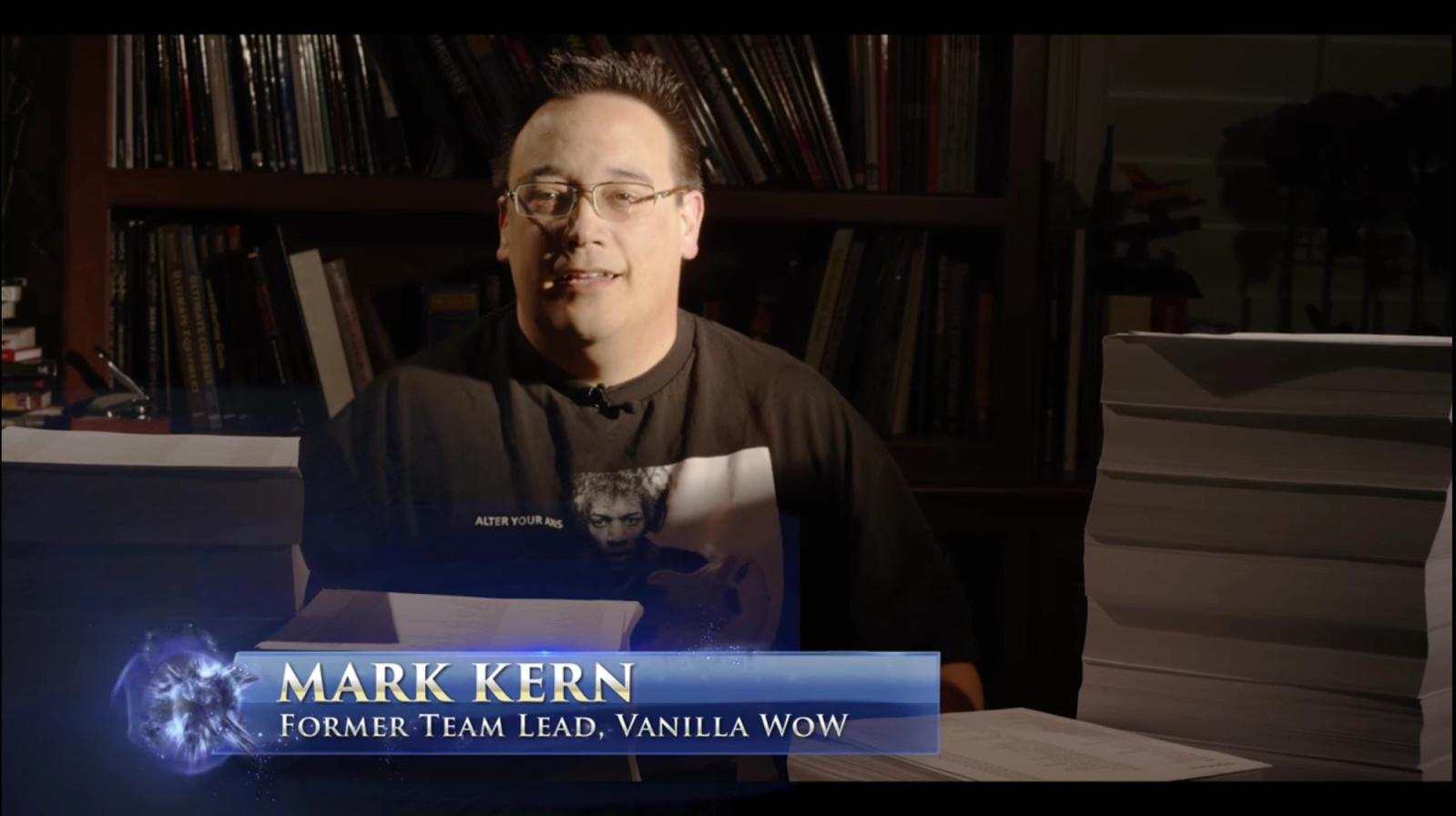 mark kern sits at a desk