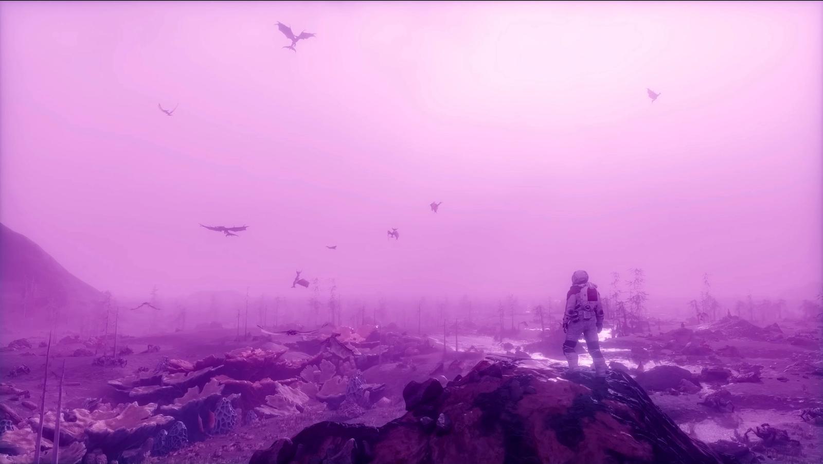 an explorer stands on a purple planet